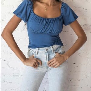NWT Favlux Blue Top with puff capped sleeves.